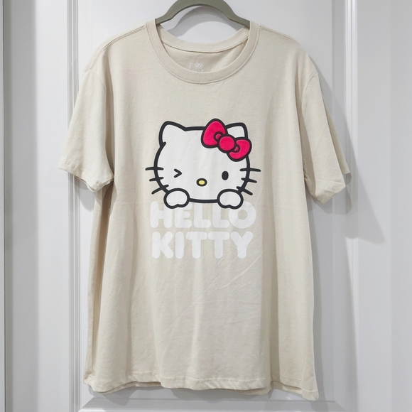 Hello Kitty Tops - ✨️4/$20. Hello Kitty Beige Tee, Novelty Cream Short Sleeve Soft Touch Tee M